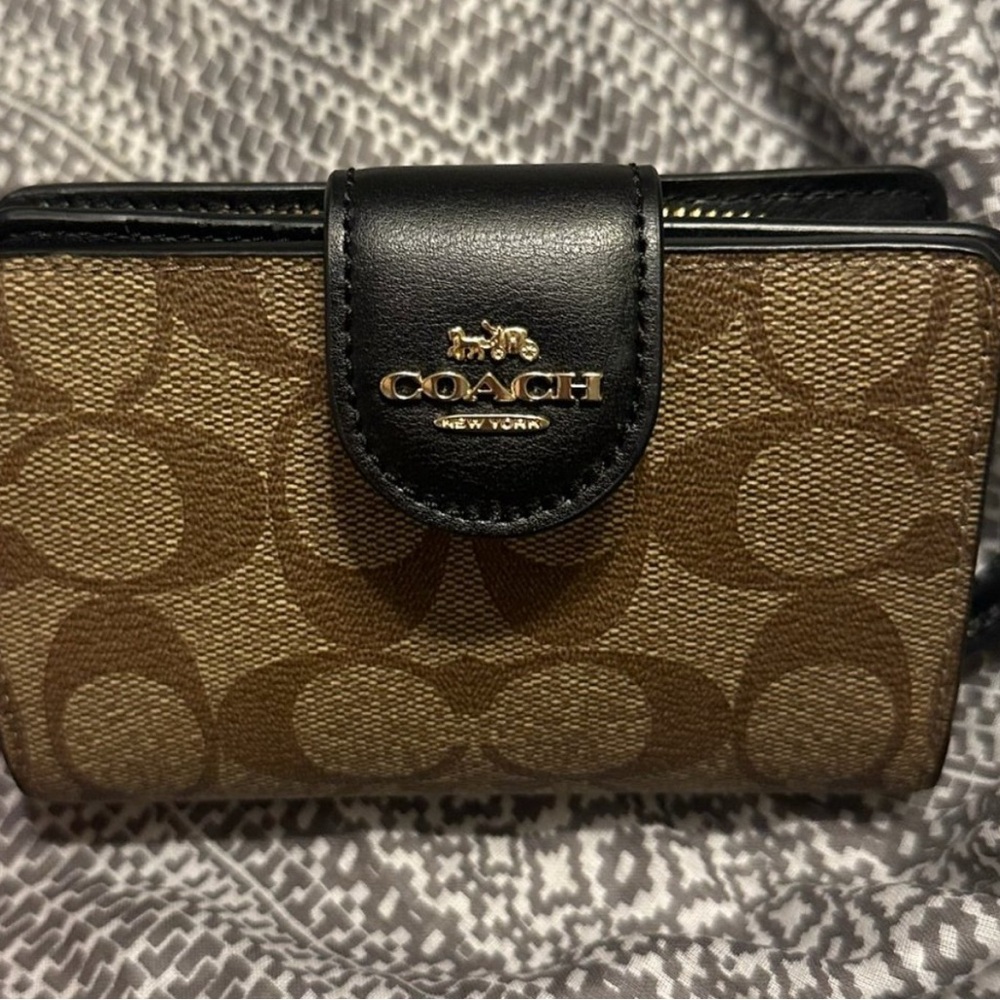 Never used Coach Tan and Black Signature Wallet